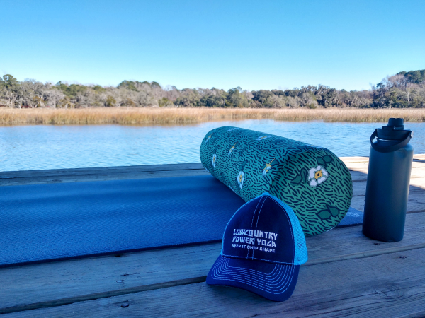 Yoga mat and hat on a dock for hot yoga charleston SC